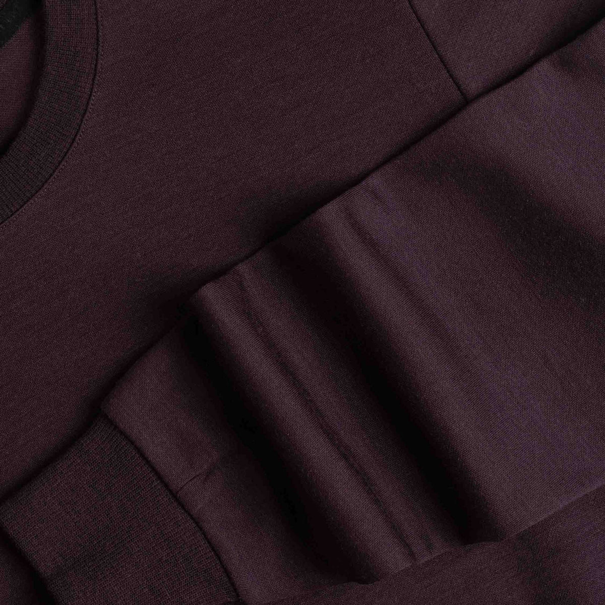 North Outdoor Alva merinopullover för dam i aubergine mulesing-fri merinoull. Designad i Finland. - 