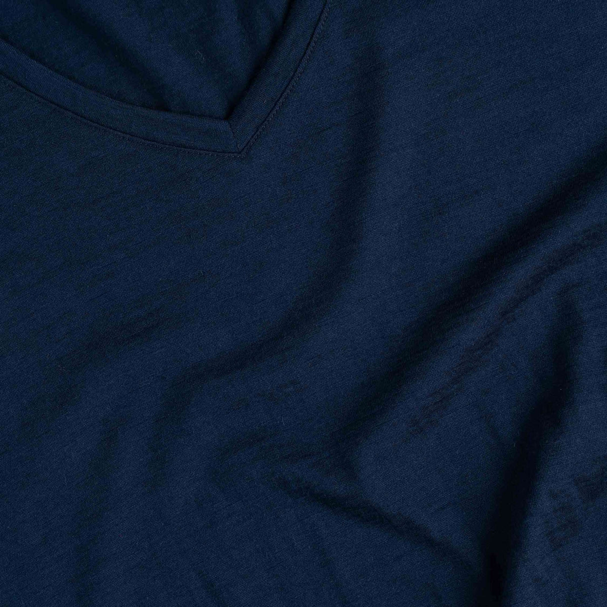 North Outdoor Olivia merino T-paita W värissä tumma mustikka, mulesing-vapaa merinovilla. Suunniteltu Suomessa. - 