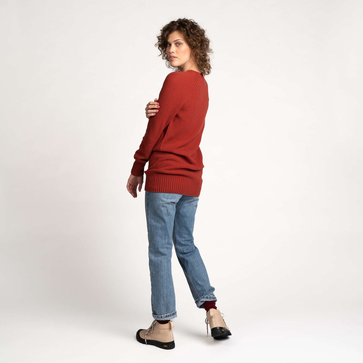 North Outdoor Pihla Women's merino wool sweater in terracotta, mulesing-free merino wool. Made in Finland. - Model is 177 cm tall and wears size S