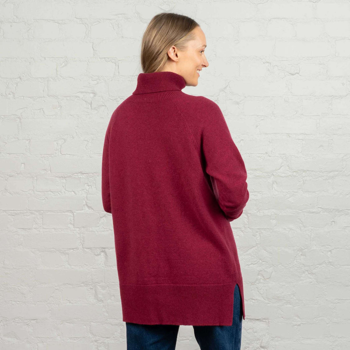 North Outdoor Tunturi women's merino knit sweater in arctic bramble mulesing-free merino wool. Made in Finland. - Model is 174 cm and wears size M
