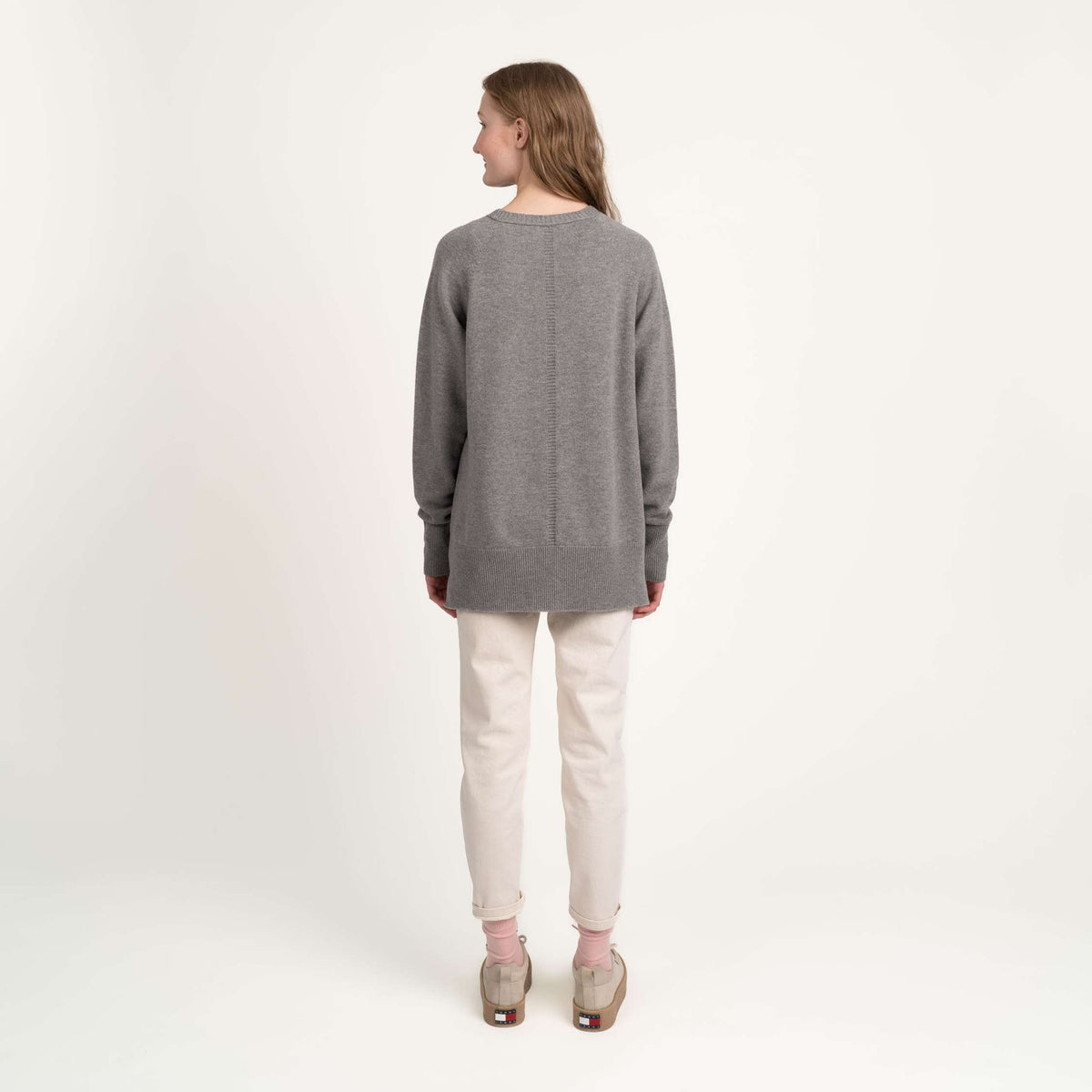 North Outdoor Hiutale Women's merino knit sweater in light grey, mulesing-free merino wool. Made in Finland. - The model is 178 cm tall and wears size S