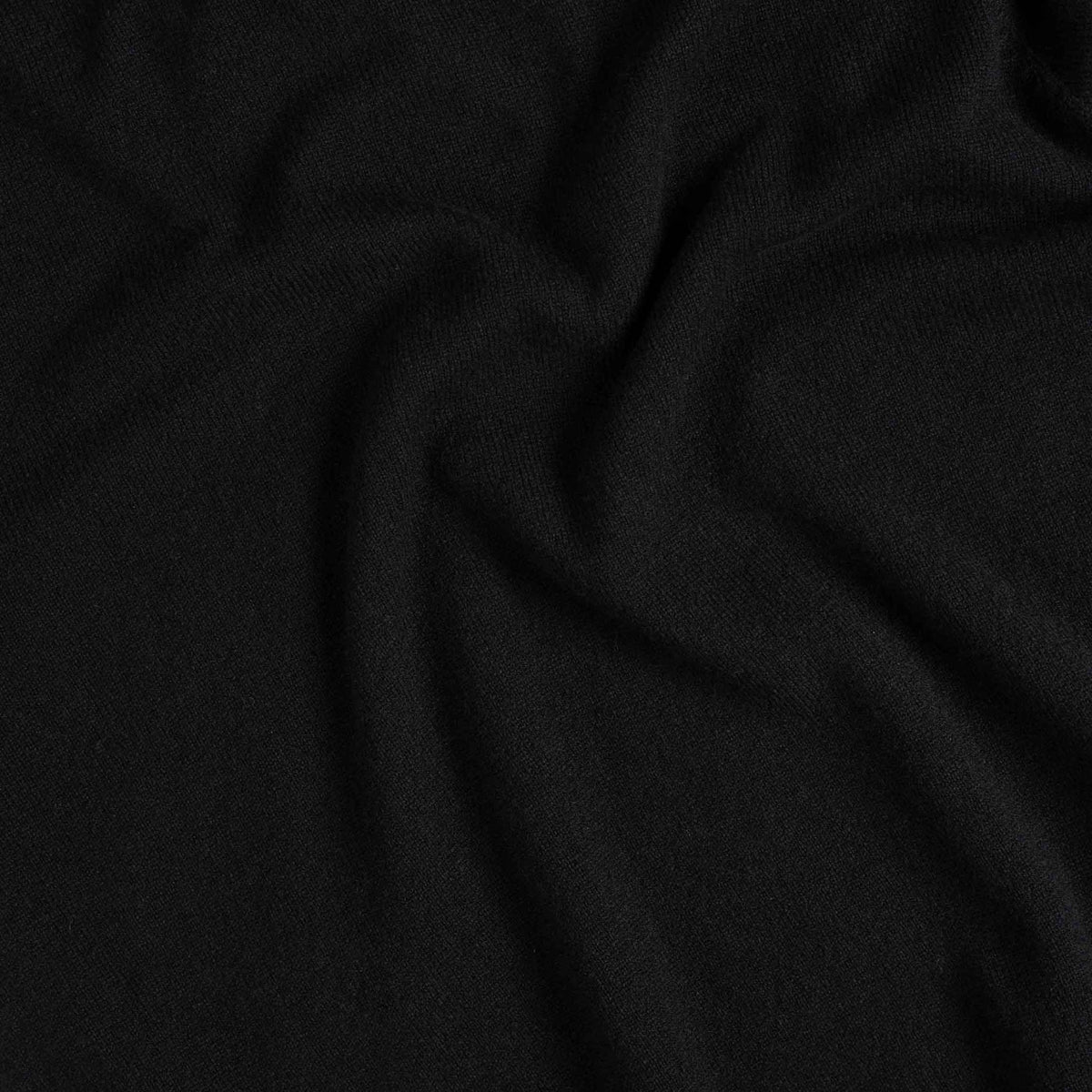 North Outdoor Kide merino stickad tröja för dam i kolsvart mulesing-fri merinoull. Tillverkad i Finland. - 