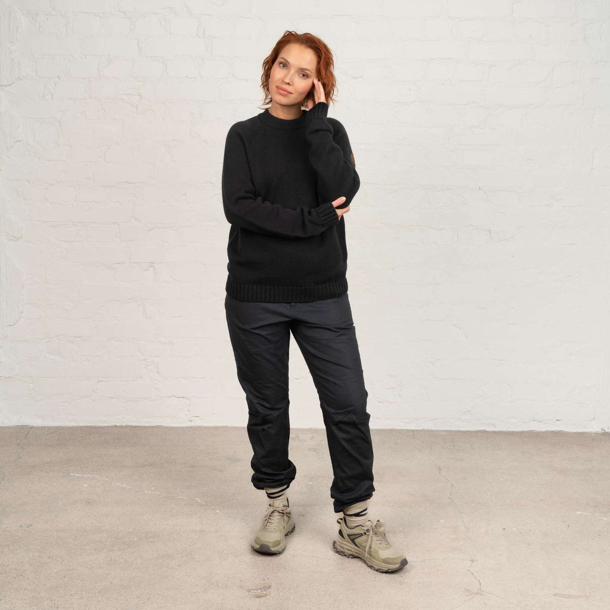North Outdoor Viima women's merino wool sweater in charcoal mulesing-free merino wool. Made in Finland. - Model is 173 cm and wears size M
