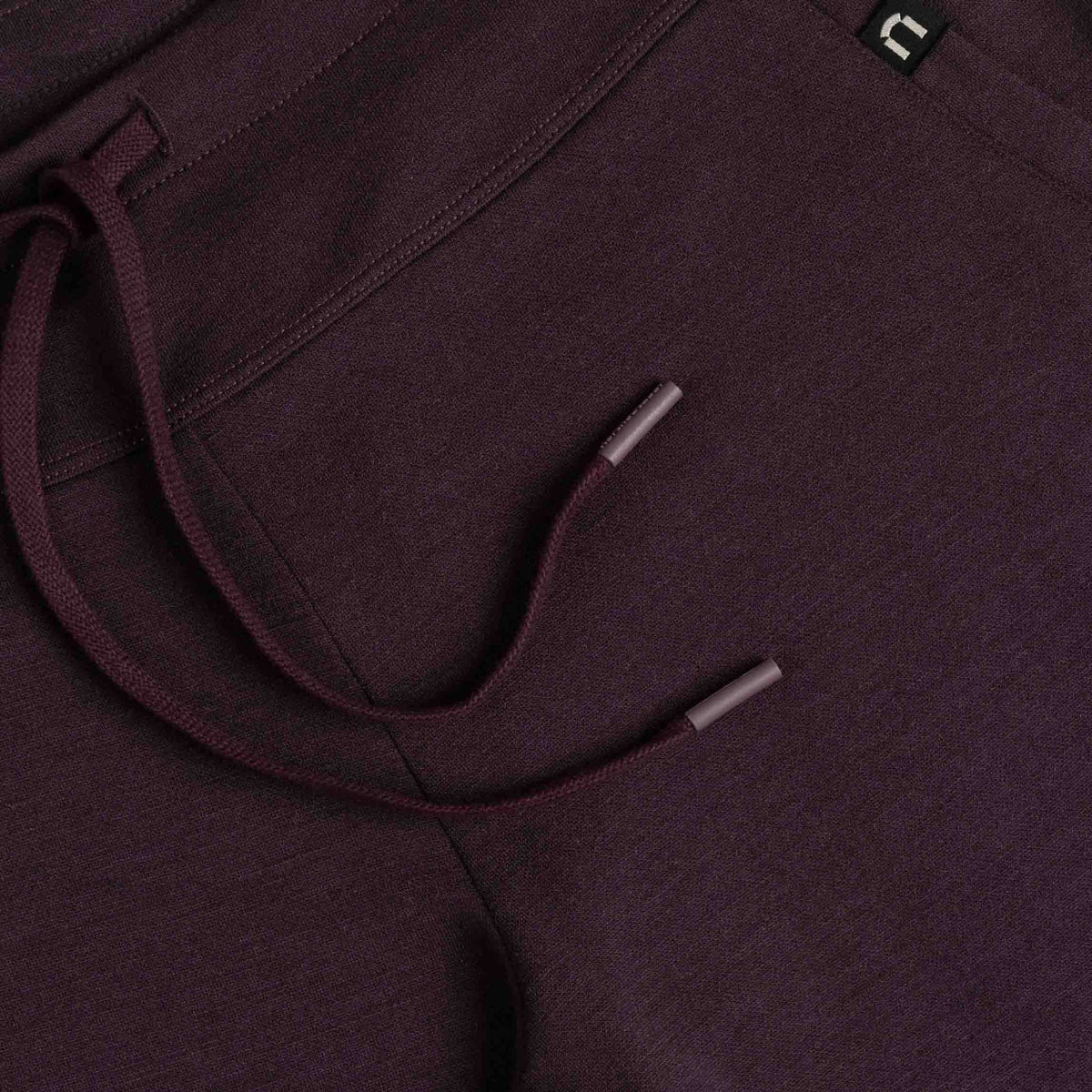 North Outdoor Jona women's merino pants in aubergine mulesing-free merino wool. Designed in Finland. - 