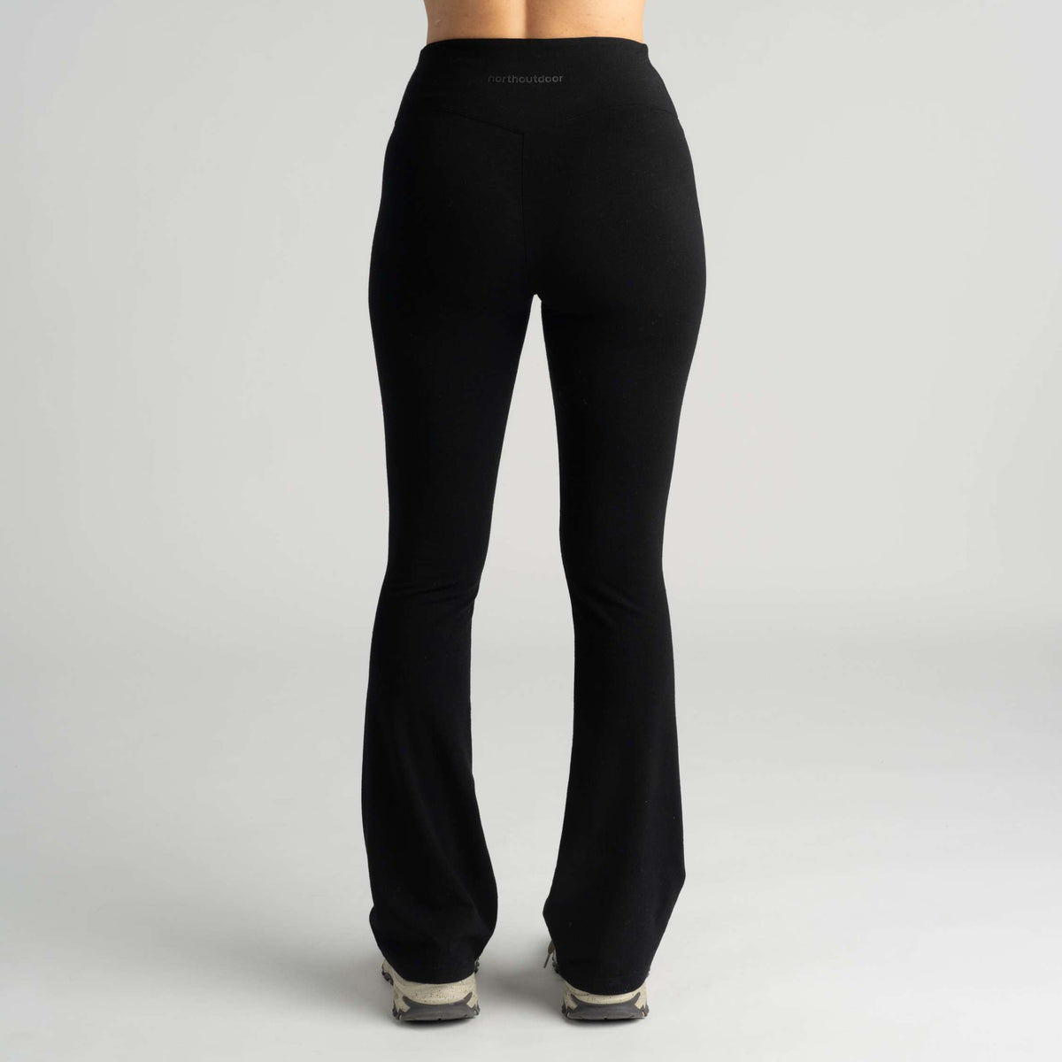 North Outdoor Aya women's flared merino leggings in black, mulesing-free merino wool. Designed in Finland. - Model is 174 cm and wears size S / LONG