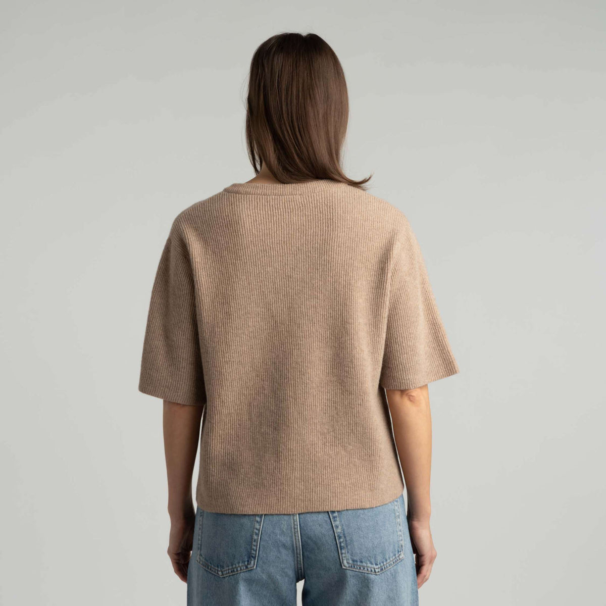 North Outdoor Sointu women's knit cardigan in latte mulesing-free merino wool. Designed in Finland. - Model is 175 cm and wears size S