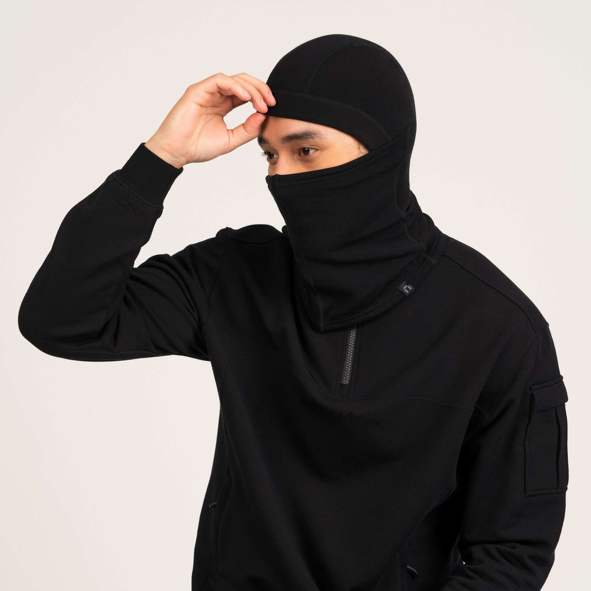North Outdoor Arctic 250 merino kypärähuppu värissä musta, mulesing-vapaa merinovilla. Suunniteltu Suomessa. - 