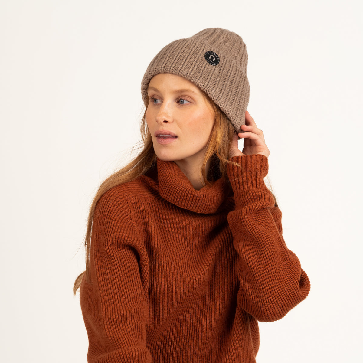 North Outdoor Kaisla merinomuts in de kleur latte, mulesing-vrij merinowol. Gemaakt in Finland. - 